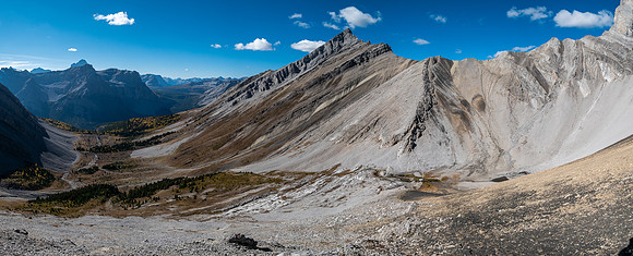 Traversing rubble and scree slopes west towards False Allenby.