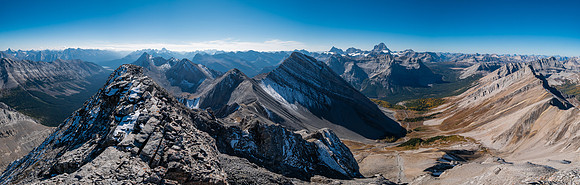 Views south and west (R) off the southernmost (1st) summit.