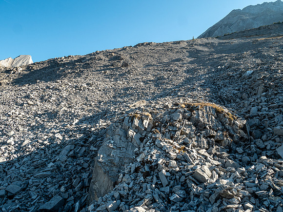 Hiking up rubble slopes SW of Mount Mercer.