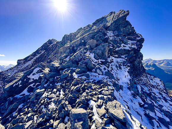 Traversing back along the difficult south ridge of Allenby.