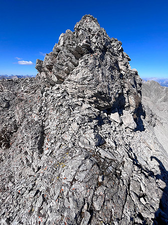 Traversing back along the difficult south ridge of Allenby.