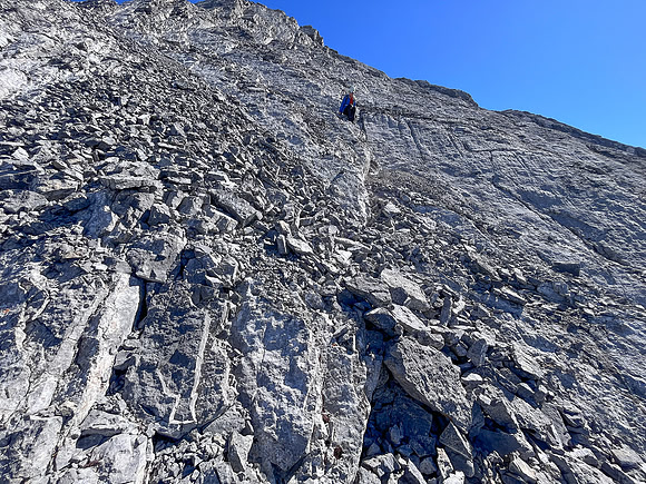 Descending the steep upper west face of Cuthead Peak.