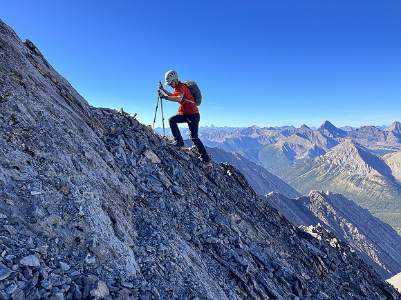 Ascending the steep upper west face of Cuthead Peak.
