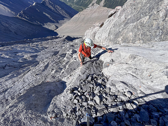 Ascending the steep upper west face of Cuthead Peak.