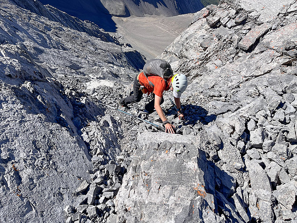 Ascending the steep upper west face of Cuthead Peak.