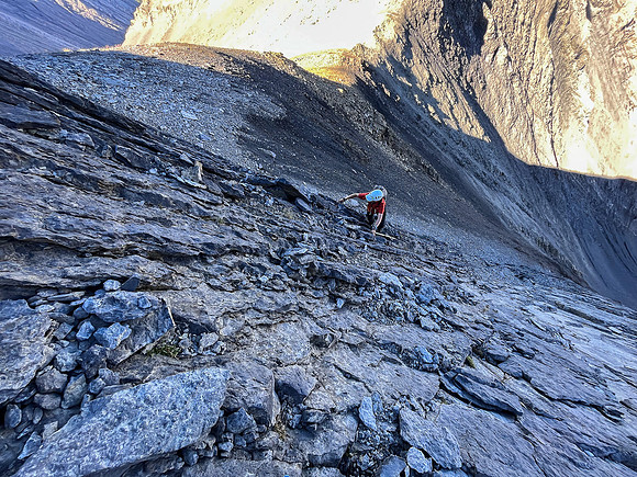 Ascending the steep upper west face of Cuthead Peak.