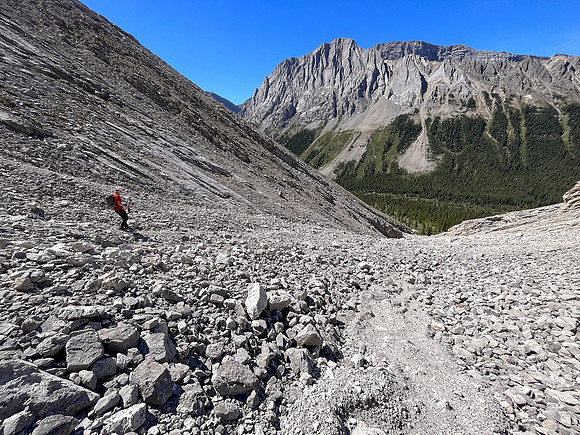 Descending rubble slopes back to the North Fork Pass trail.