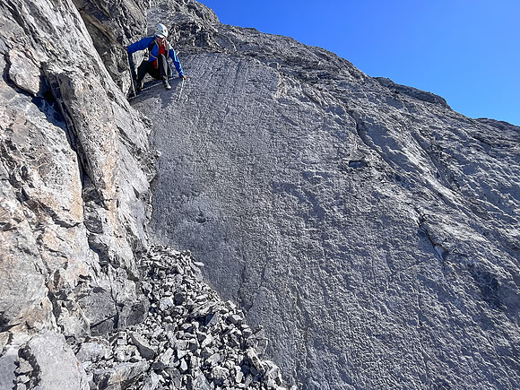 Descending the steep upper west face of Cuthead Peak.