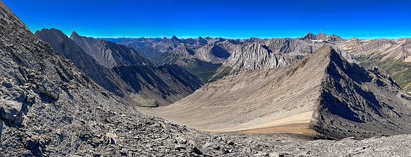 Descending the steep upper west face of Cuthead Peak.
