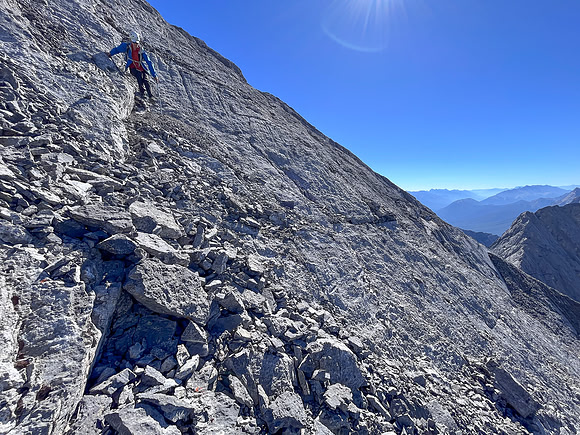 Descending the steep upper west face of Cuthead Peak.