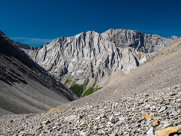 Descending rubble slopes back to the North Fork Pass trail.