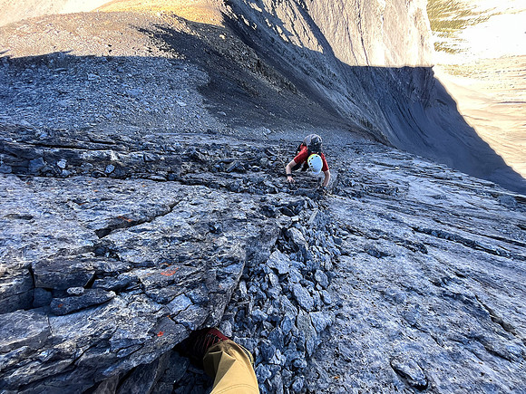 Ascending the steep upper west face of Cuthead Peak.