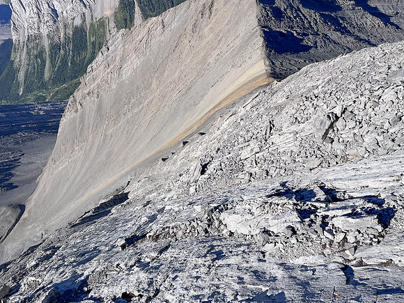 Descending the steep upper west face of Cuthead Peak.