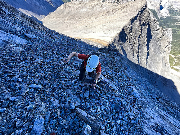 Ascending the steep upper west face of Cuthead Peak.