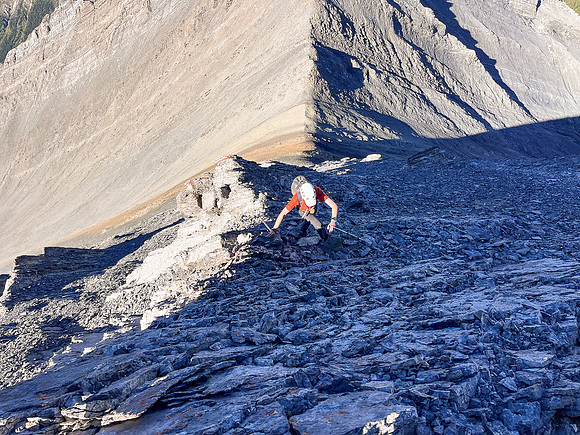 Ascending the steep upper west face of Cuthead Peak.