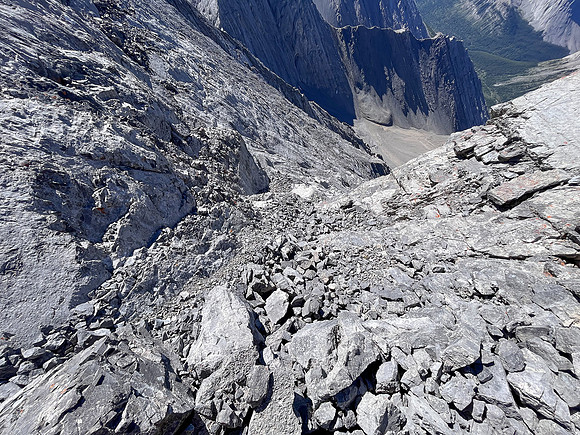 Descending the steep upper west face of Cuthead Peak.