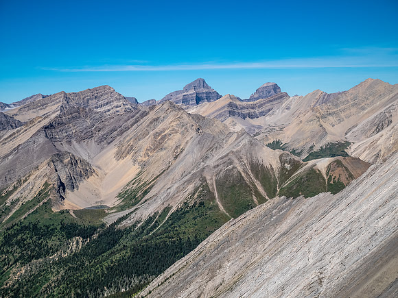 Descending the steep upper west face of Cuthead Peak.