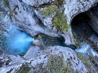 A scenic waterfall near the Flints Park campground with the North Cascade River flowing towards the Cascade River.