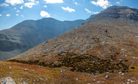 Cornelius hikes up to the moderate slabs above. Scrimger at upper left.
