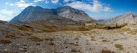 Mount Scrimger from atop the headwall. Route traverses a scree bench under the summit at center.