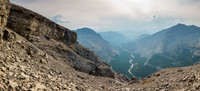 Traversing around the upper cliffs. Gill Peak at right and Henretta Creek below.