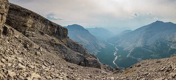 Traversing around the upper cliffs. Gill Peak at right and Henretta Creek below.