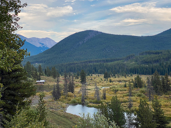 Looking over a cabin along Cataract Creek as we near the parking lot.