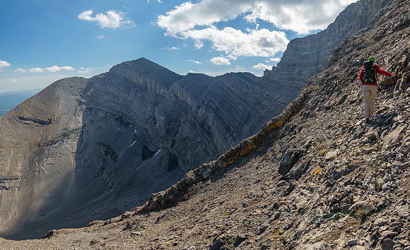 Traversing steep scree to the bench.
