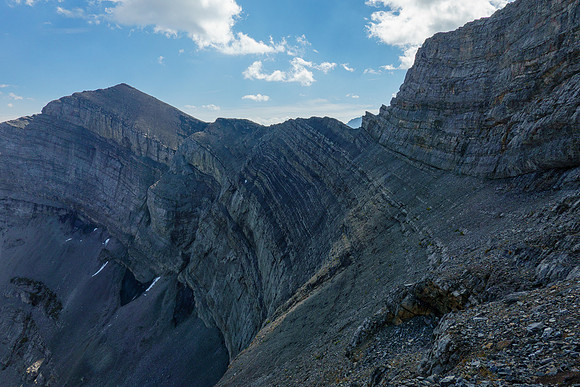 The scree bench traverse with Scrimger's summit at left.