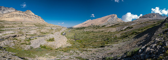 Hiking across Beauty Creek valley under Mount Wurzburg.