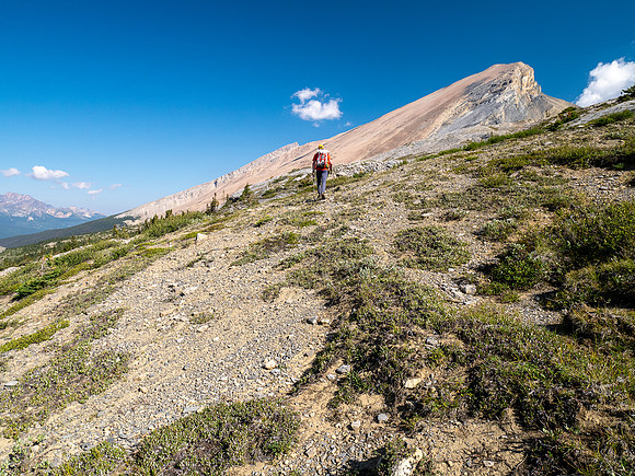 Hiking across Beauty Creek valley under Mount Wurzburg.