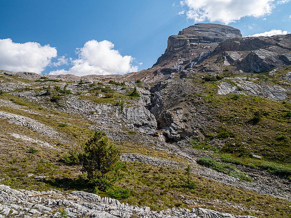 Hiking across Beauty Creek valley under Mount Wurzburg.