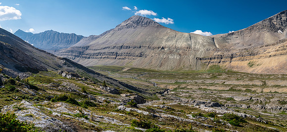 Hiking across Beauty Creek valley under Mount Wurzburg.