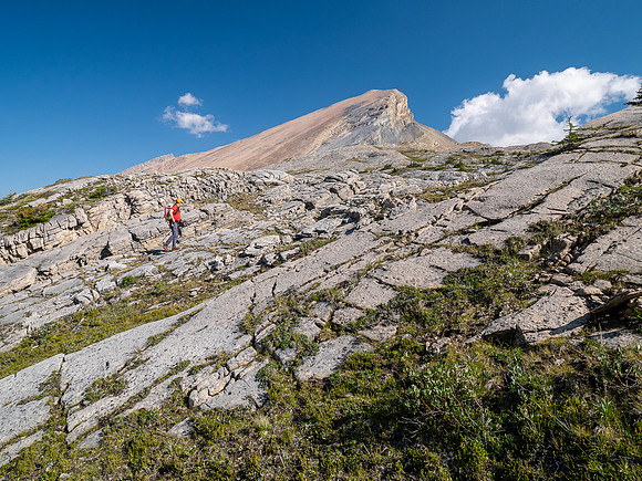 Hiking across Beauty Creek valley under Mount Wurzburg.