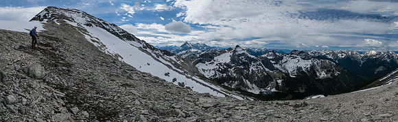 Ascending along the west ridge with stunning views.