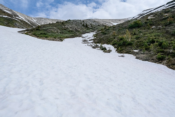 Moving up the avalanche gully on firm snow.