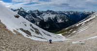 Transitioning off snow onto loose scree.