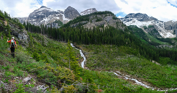 Traversing avalanche slopes back to find the trail in the forest.