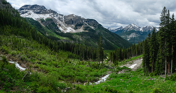 Traversing avalanche slopes back to find the trail in the forest.