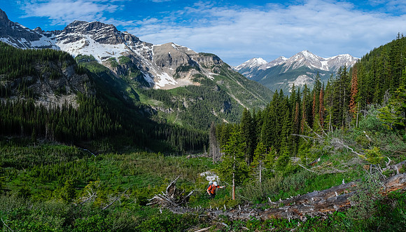 Phil hikes up the avalanche slopes to the west ridge.