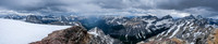 Traversing the summit block views from the Royal Group to the Assiniboine Group (R).