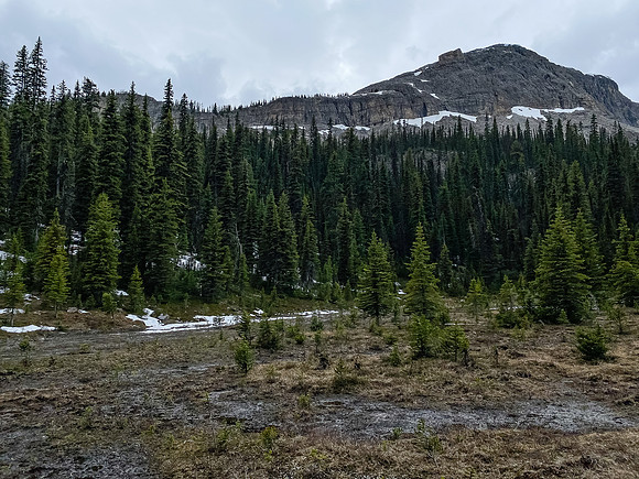 The headwall above the meadow (L).