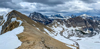 Returning down the SE ridge of Red Man Mountain the low col at right center.
