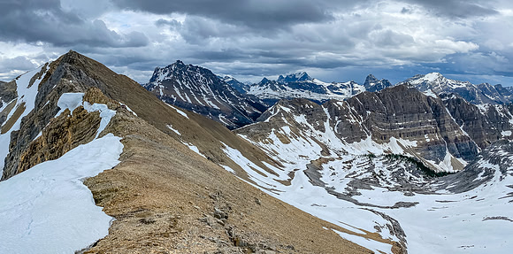 Returning down the SE ridge of Red Man Mountain the low col at right center.