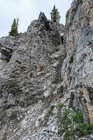 Phil navigates up the moderate / difficult gully through the headwall.