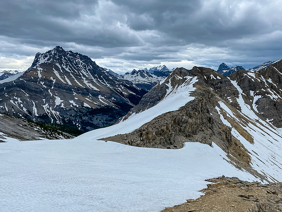Crossing the low col with White Man Mountain at left.