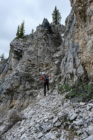 Phil starts up the moderate / difficult gully through the headwall.