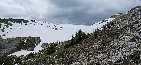 Views ahead to the low col at center and false summit at upper right.
