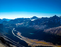 View to the south down hwy 93 with Mount Saskatchewan stealing the show above and a brilliant tarn stealing the show below.