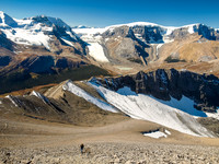 Rod completes the traverse - the trail in the scree clearly visible at left.